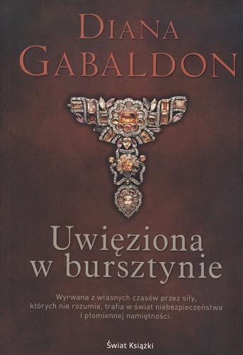 Okładka książki Uwięziona w bursztynie / Diana Gabaldon ; [przekł. Karolina Bober et al.].