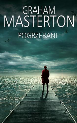 Okładka książki Pogrzebani / Graham Masterton ; z angielskiego przełożył Grzegorz Kołodziejczyk.