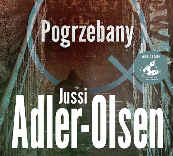 Okładka książki Pogrzebany / Jussi Adler-Olsen ; z języka duńskiego przełożyła Joanna Cymbrykiewicz.