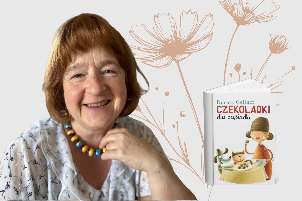 Uśmiechnięta kobieta z rudymi włosami trzyma ręką korale na szyi, po prawej okładka książki, w tle rysunek kwiatów