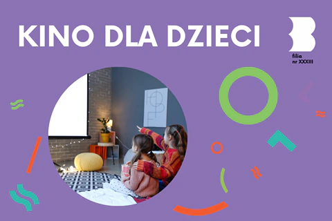 Dwie dziewczynki siedzą na wykładzinie, patrząc się na ekran naścienny.