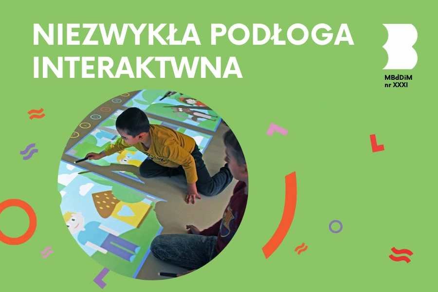 Na interaktywnej macie wyświetlane są elementy gry, w którą bawi się dwójka dzieci.