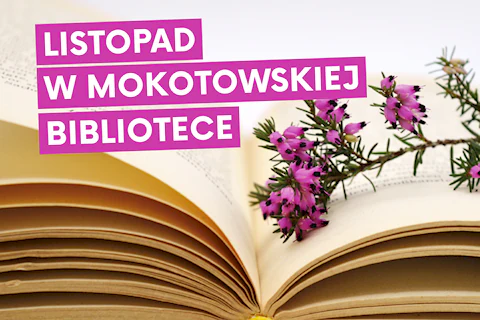 otwarta książka, na niej gałązka wrzosu