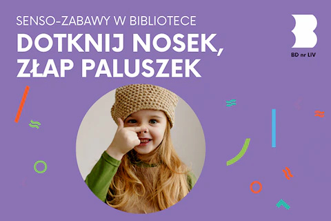 Rudowłosa dziewczynka w czapce dotyka palcem swój nosek.