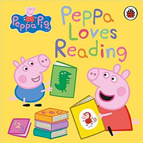 Okładka książki Peppa Loves Reading / adapted by Lauren Holowaty ; Peppa Pig is created Neville Astley and Mark Baker.
