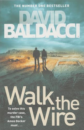 Okładka książki Walk the wire / David Baldacci.