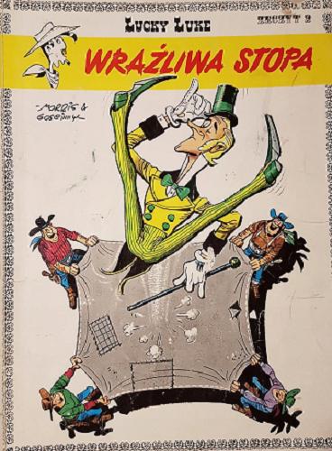 Okładka książki Wrażliwa stopa / tekst René Goscinny ; ilustracje Morris ; przekład Jolanta Sztuczyńska.