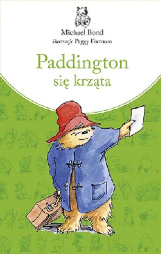 Okładka książki Paddington się krząta / Michael Bond, przełożył Michał Rusinek, ilustracje Peggy Fortnum.