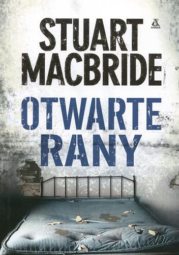 Okładka książki Otwarte rany / Stuart MacBride ; przekł. [z ang.] Wojciech Szypuła.