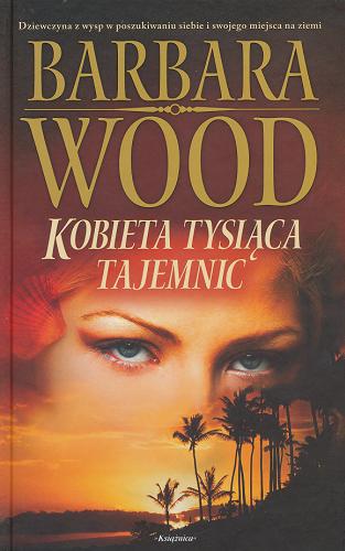 Okładka książki Kobieta tysiąca tajemnic / Barbara Wood ; przeł. z ang. Michał Madaliński.