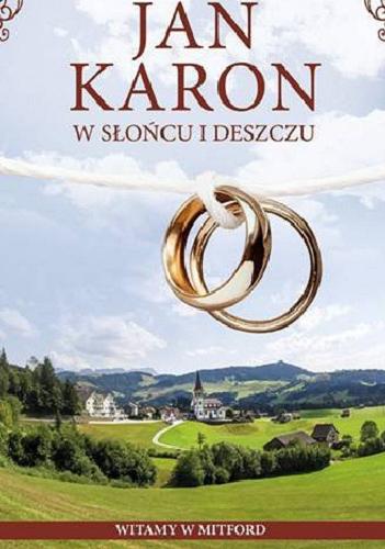 Okładka książki W słońcu i w deszczu / Jan Karon ; przełożyła Mira Czarnecka.