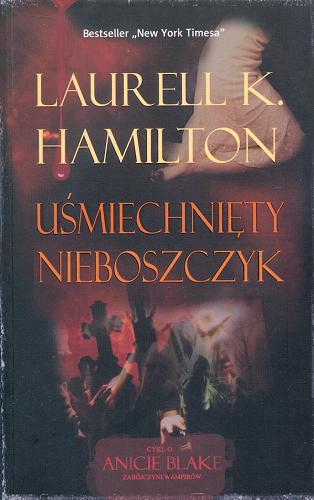 Okładka książki Uśmiechnięty nieboszczyk / Laurell K. Hamilton ; przeł. Robert P. Lipski.