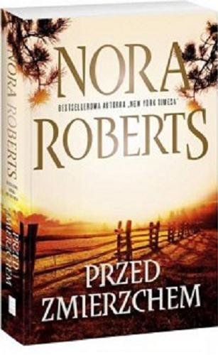 Okładka książki Przed zmierzchem / Nora Roberts ; przełożyła Magdalena Rabsztyn.