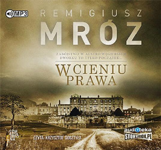 Okładka książki W cieniu prawa [E-audiobook] / zabójstwo w austro-węgierskim dworku to tylko początek... / Remigiusz Mróz.